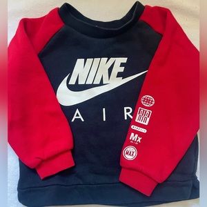 Nike two tone pull over sweater. Good condition. Size 2T